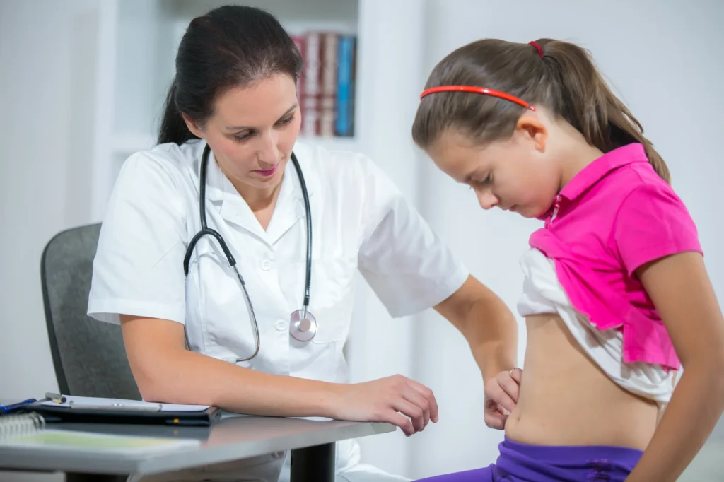 A female doctor's annual medical check-up of a little girl.